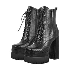 Pair of black chunky platform lace-up ankle boots showcasing the front lacing and side zipper.