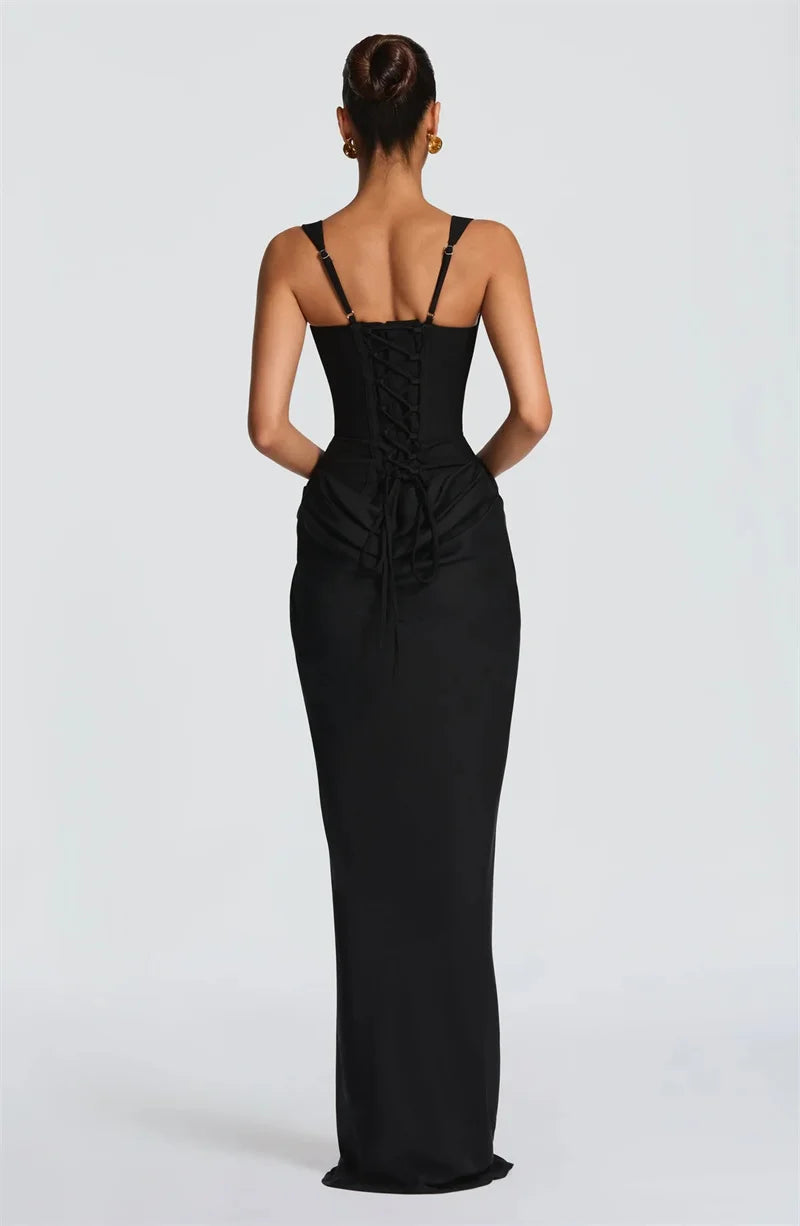 Black evening gown with thin straps on a white background