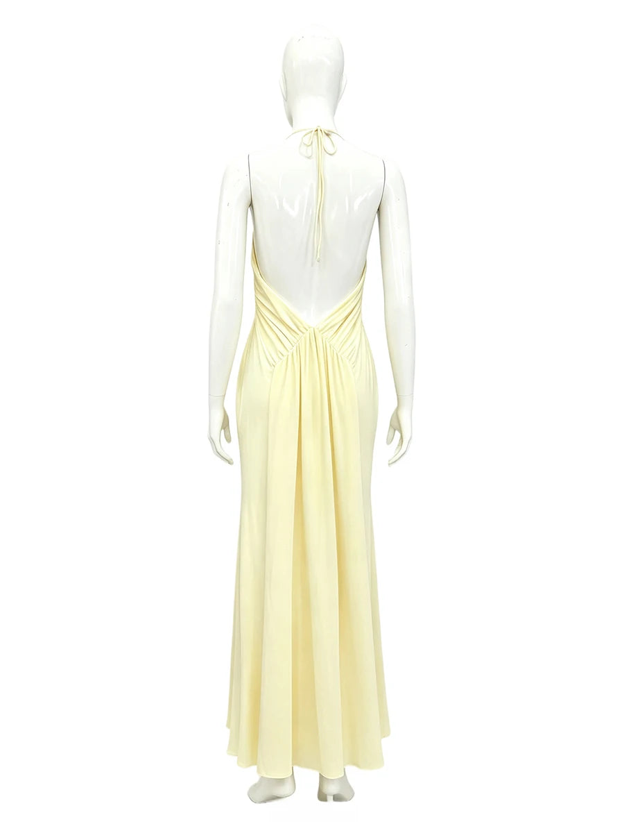Back view of halter neck ruched maxi dress