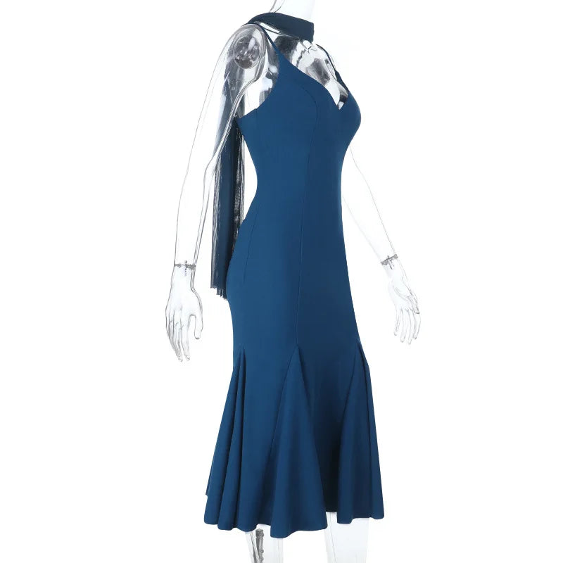 Blue dress on a mannequin against a white background