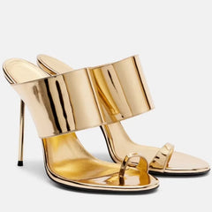 Pair of gold metallic toe ring stiletto mules