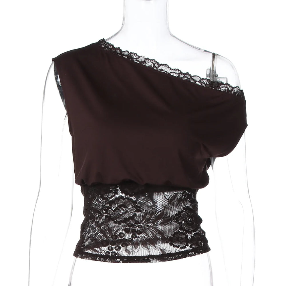Black one-shoulder top with lace detail on a mannequin against a white background