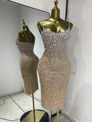 Crystal embellished spaghetti strap knee length dress front view