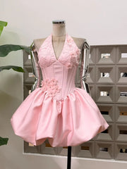 Pink appliqued floral halter mini dress with corseted bodice and bubble hem