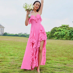  A model wearing the ruffle maxi dress, showcasing its movement and graceful drape. Golden Atelier 2