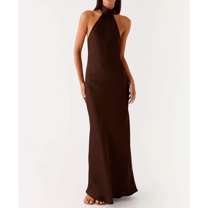 Brown halter neck gown on a white background