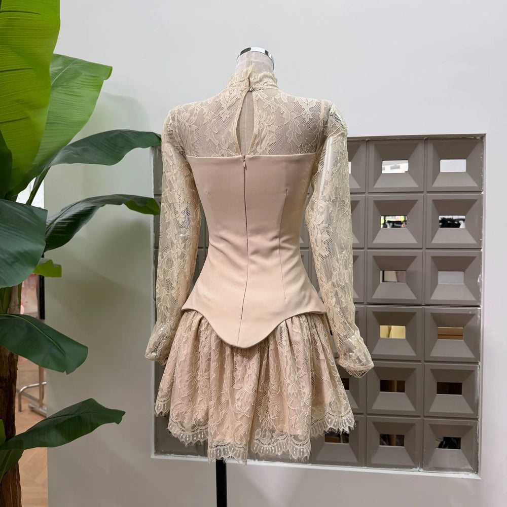 Apricot lace high neck mini dress with sheer long sleeves and structured bodice, back view