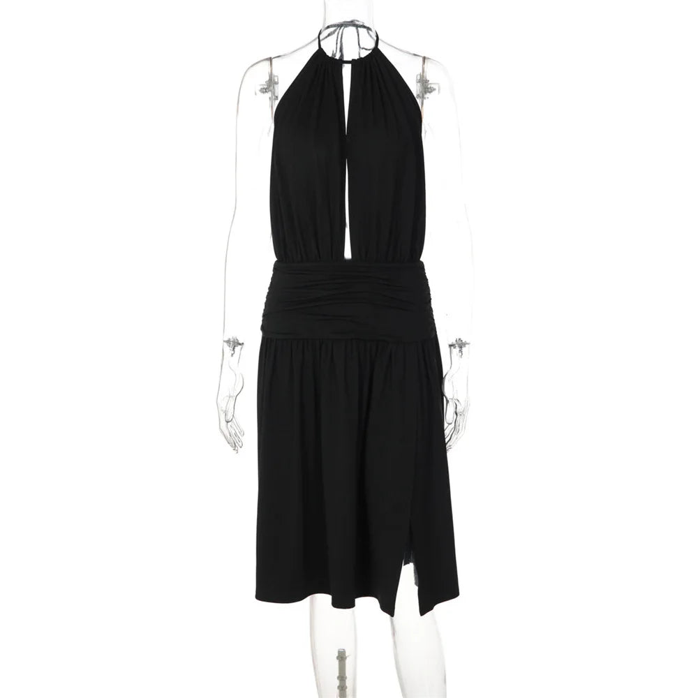 Black halter neck dress on a mannequin against a white background