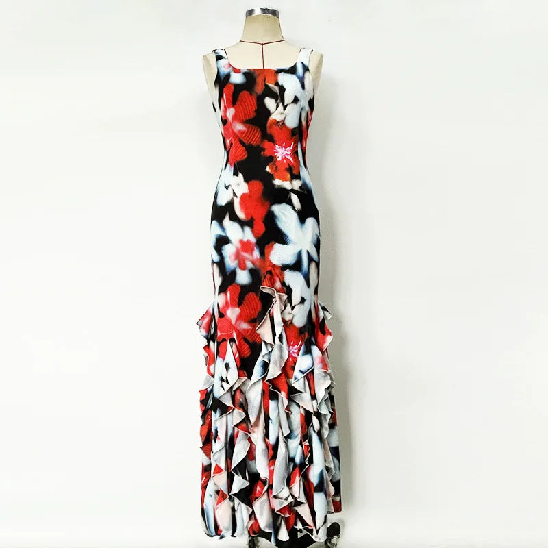 Colorful floral dress on a mannequin against a white background