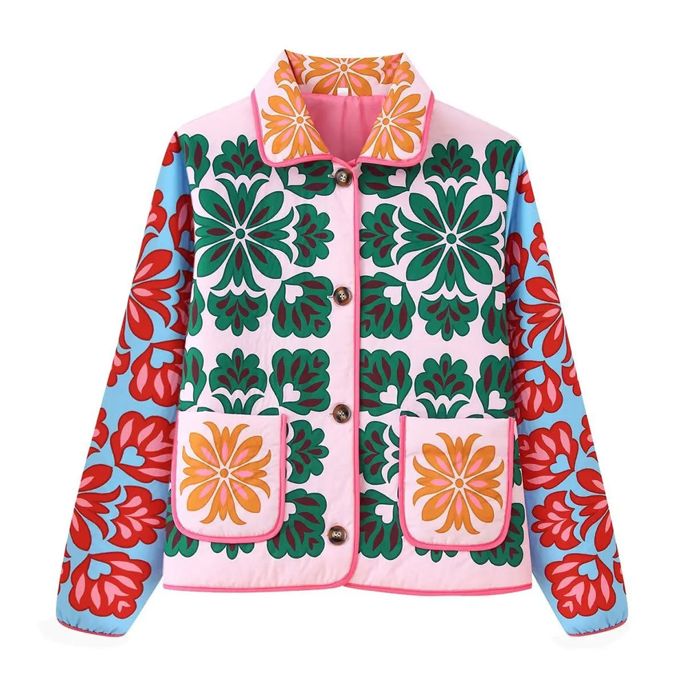 Close-up of the floral print design on a pink quilted jacket.