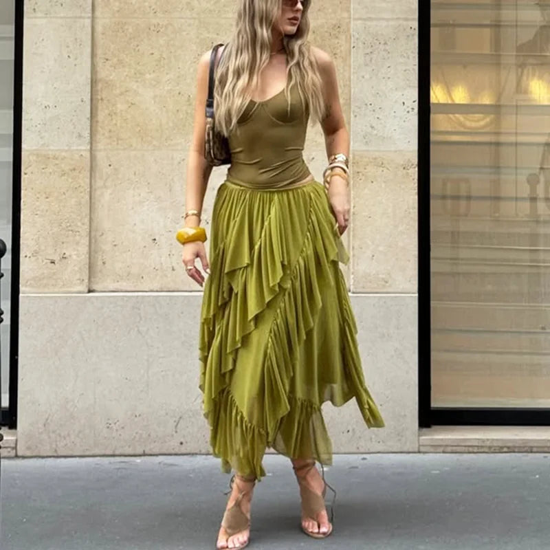 Person wearing flowing ruffled asymmetric hem maxi skirt