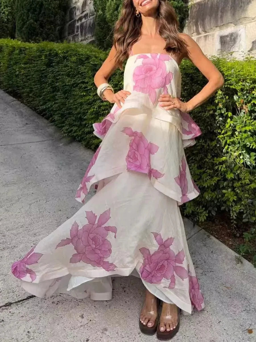Woman posing in a floral print layered midi dress