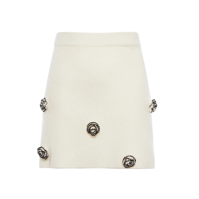 White skirt with decorative buttons 