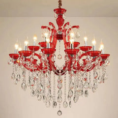 Elegant chandelier with crystal pendants and candle lights.