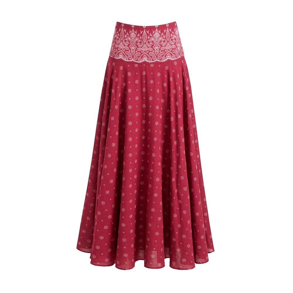 Red bandana print bikini and maxi skirt laid out together
