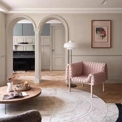 Pink quilted armchair in modern living room