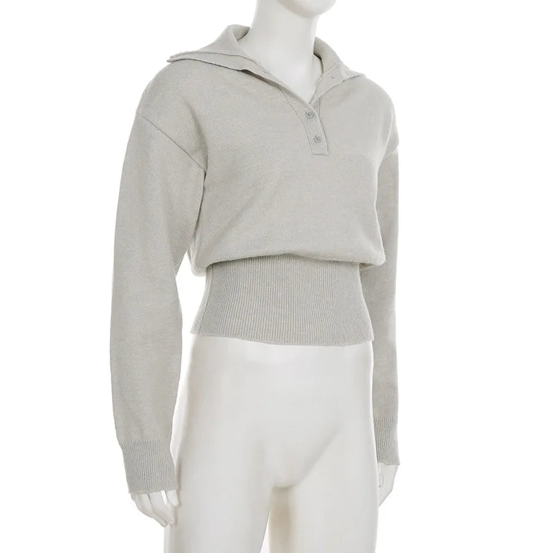 Side view of knitted pullover highlighting slim shoulders and easy sleeve movement