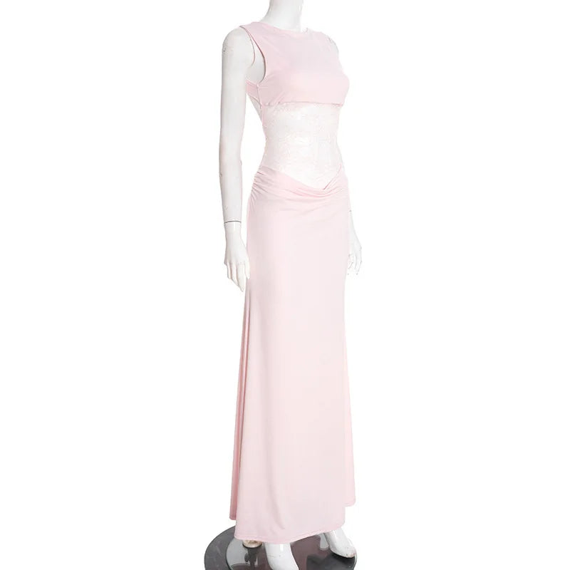 Mannequin wearing a light pink evening gown on a white background