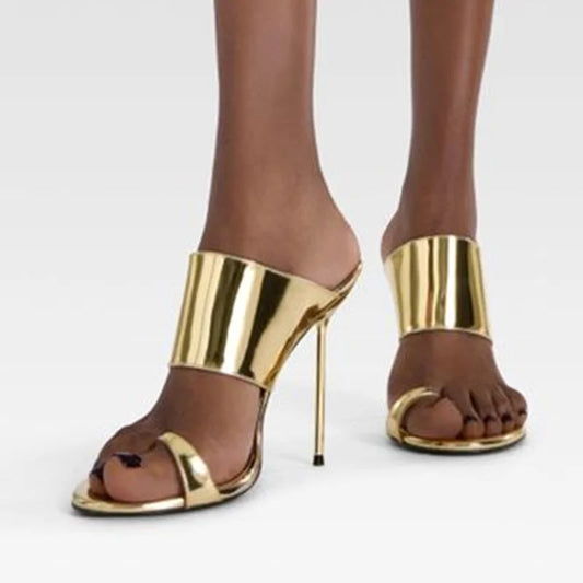 Metallic gold toe ring stiletto mules