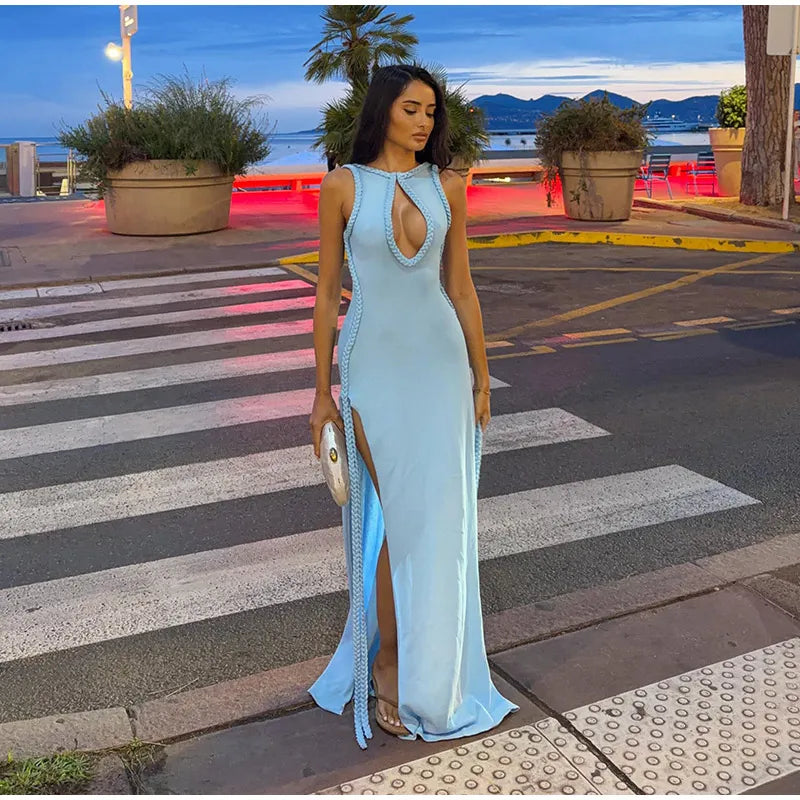 Woman wearing a light blue braided trim cutout maxi dress on a street