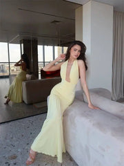 Yellow deep neck ruched halter maxi dress