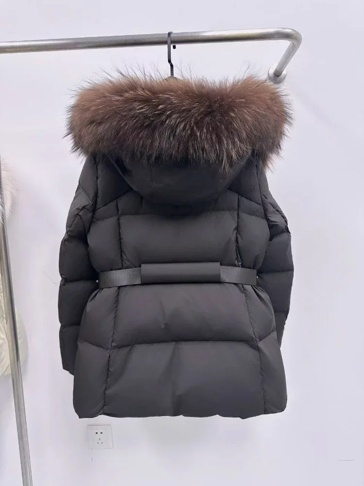 Dark gray puffer jacket with fur hood on a white background