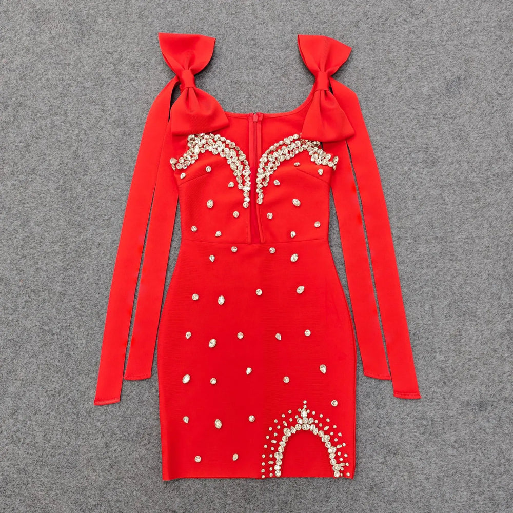 Red embellished bow strap mini dress laid flat