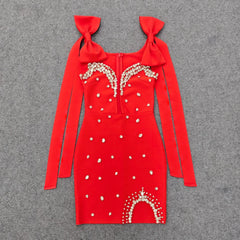 Red embellished bow strap mini dress laid flat