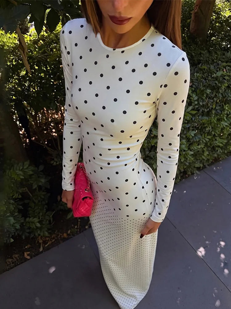 Close-up of white polka dot crew neck long sleeve maxi dress