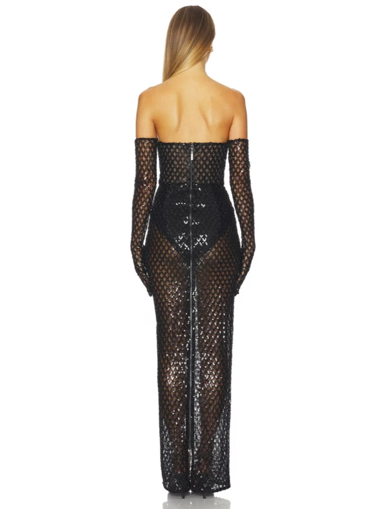 Black fishnet dress with long sleeves on a white background