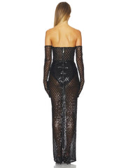 Black fishnet dress with long sleeves on a white background