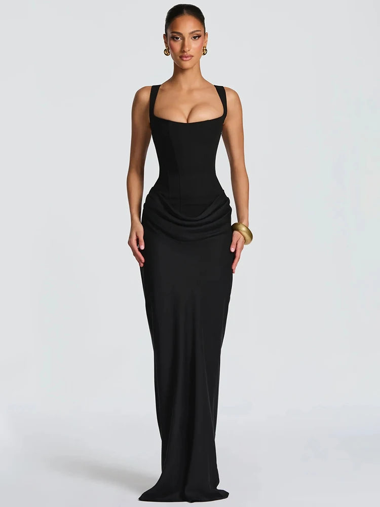 Woman wearing a black evening gown on a white background