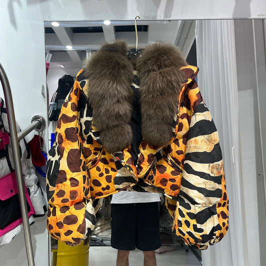 Front view of leopard print puffer jacket with fur collar