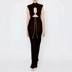 Black evening gown with cut-out design on a white background