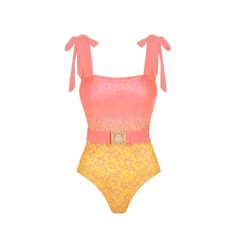 Close-up of the one-piece swimsuit with belted waist.