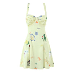 Light yellow dress with colorful patterns on a white background