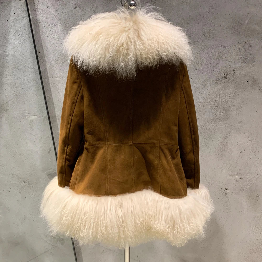 Brown suede jacket with white fur trim on a mannequin against a gray background