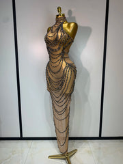 Side view of chain embellished halter gown