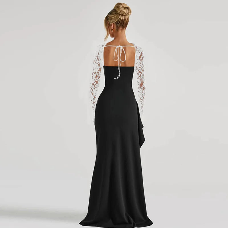 Black evening gown with lace sleeves on a white background