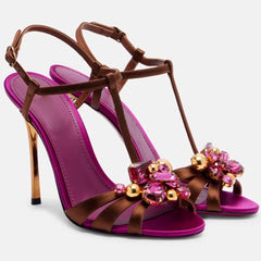 Pair of stiletto heels with floral rhinestone embellishment