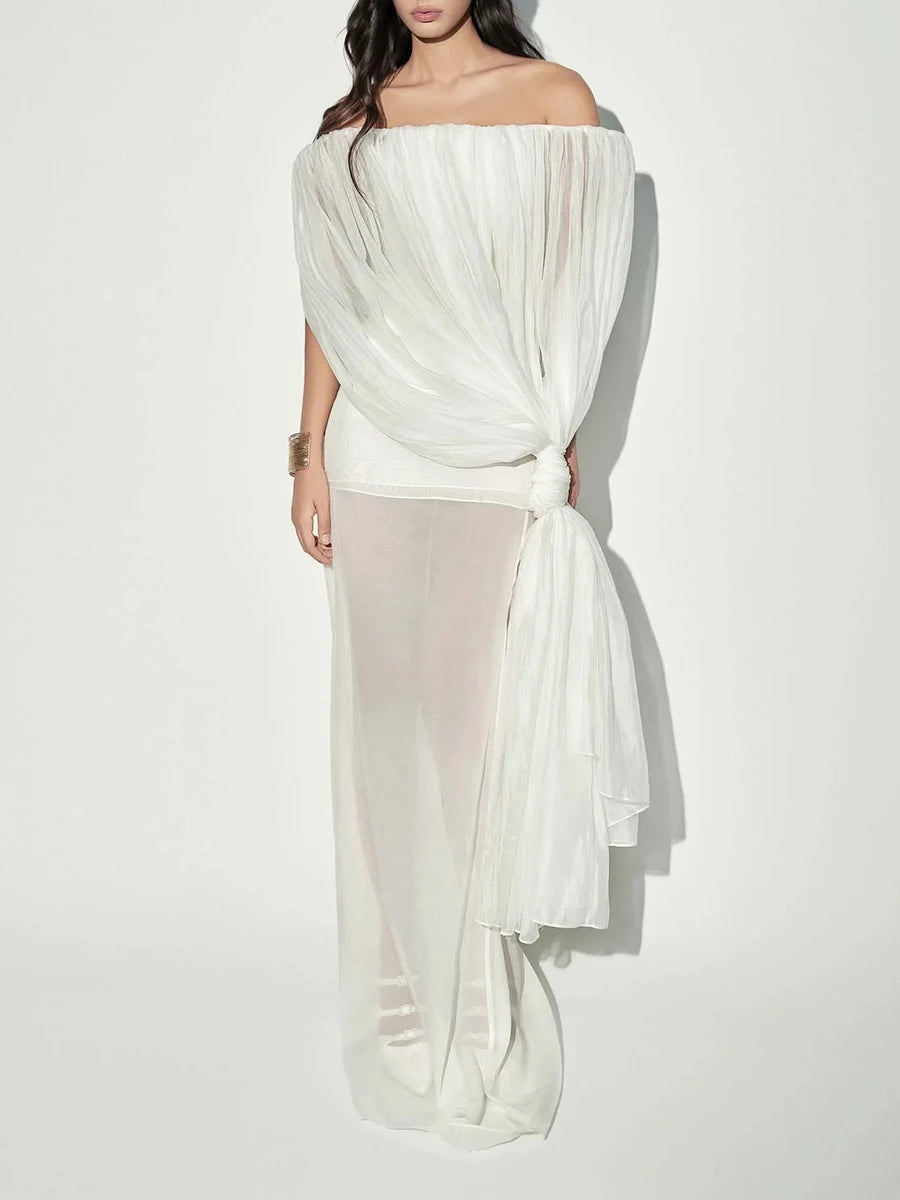 White off-shoulder dress on a white background