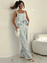 Full view of floral print peplum corset top and wide leg pants set