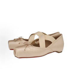 Pair of beige ballet flats on a white background