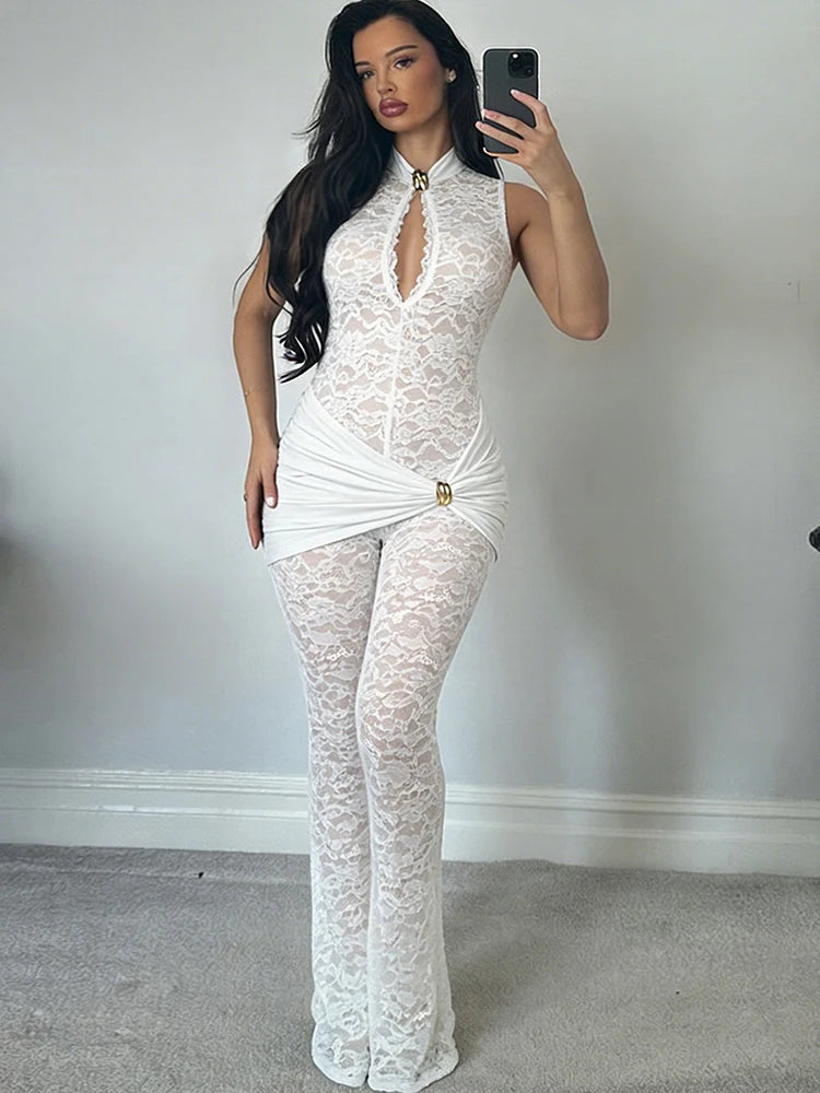 White lace mock neck halter jumpsuit with flared legs and ruched waist.