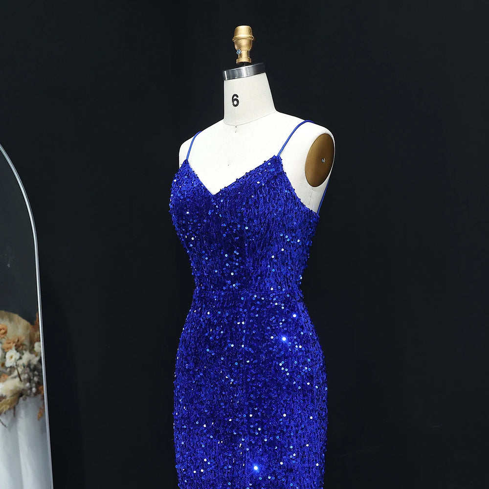 Blue sequin dress on a mannequin against a black background