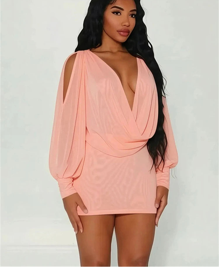 Pink knit mini dress with deep V-neck and long puff sleeves
