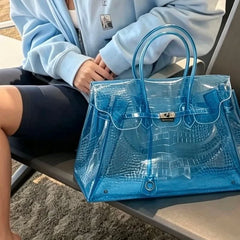 Blue crocodile embossed jelly bag with model