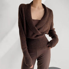 Brown knit wrap top with ribbed waist and long sleeves