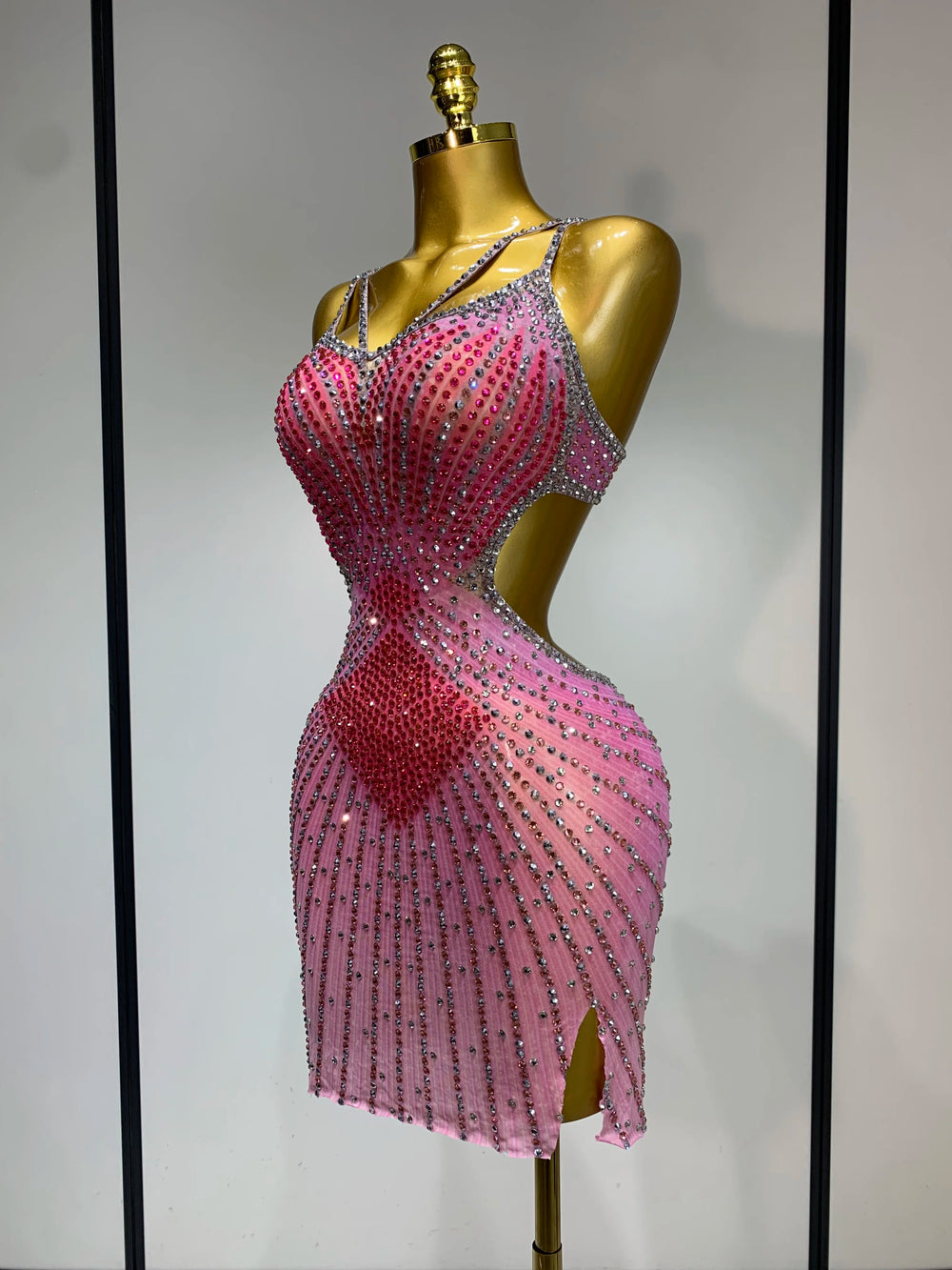 Side view of Sparkle Embellished Mini Dress with cut-out detail