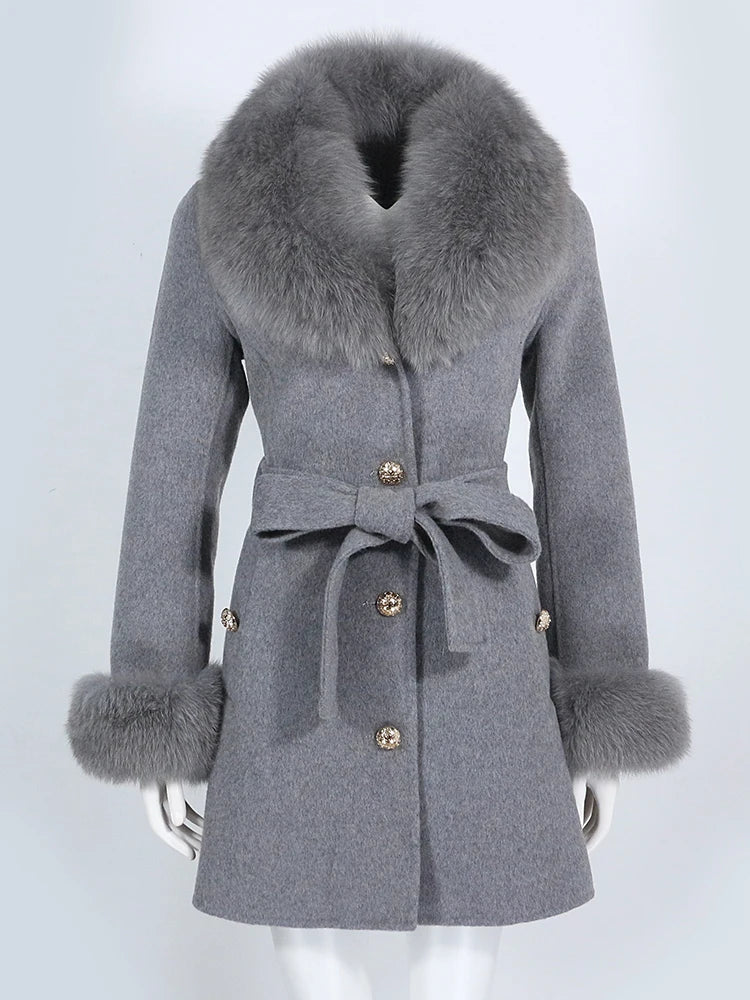 Gray coat with fur collar and cuffs on a white background